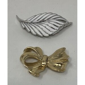 Vintage Trifari Lot of 2 Pins Silver Tone White Enamel Leaf & Gold Tone Bow